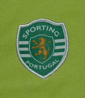 Trousers of a track suit of a young player from a Sporting Lisbon football school. Size child 14 years