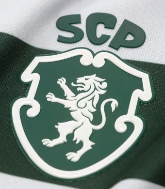2026/27. Camisola do Sporting Nike listada de crian�a, sem patroc�nio
