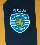 Camisola alternativa cor de laranja do Sporting, com sponsor tmn em preto sem caixa