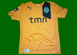 Camisola alternativa cor de laranja do Sporting, com sponsor tmn em preto sem caixa