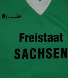 Green white shirt, unknown details. From Saxony in Germany