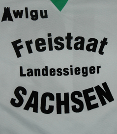 Green white shirt, unknown details. From Saxony in Germany