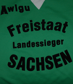 Green white shirt, unknown details. From Saxony in Germany